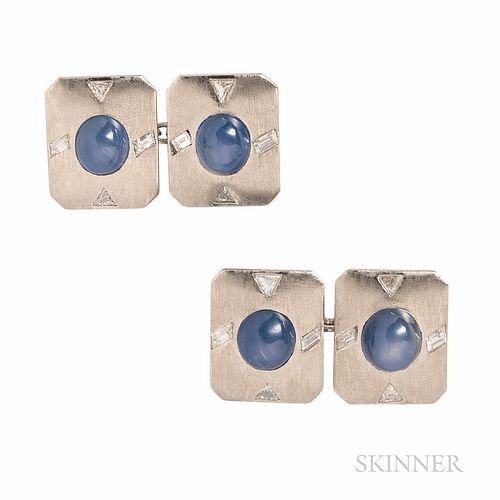 Platinum, Star Sapphire, and Diamond Cuff Links, the cabochons measuring approx. 7.00 to 7.50 mm, fancy-cut diamond accents, 13.0 dwt.
