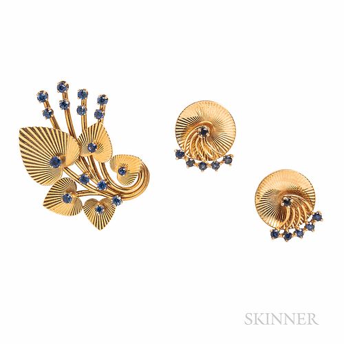 Tiffany & Co. 14kt Gold and Sapphire Suite, the brooch with ribbed leaves set with circular-cut sapphires, earclips with moveable sapph