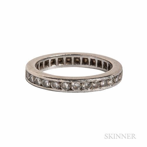 Platinum and Diamond Eternity Band, set with full-cut diamonds, approx. total wt. 0.90 cts., size 4 1/2.