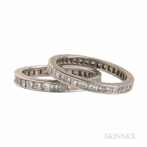 Two Platinum and Diamond Eternity Bands, set with square-cut diamonds, approx. total wt. 0.75, 1.25 cts., size 5 1/4, 5 1/2.