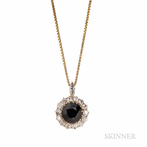Sapphire and Diamond Pendant, set with a circular-cut sapphire measuring approx. 8.00 x 6.00 mm, framed by old European-cut diamonds, a