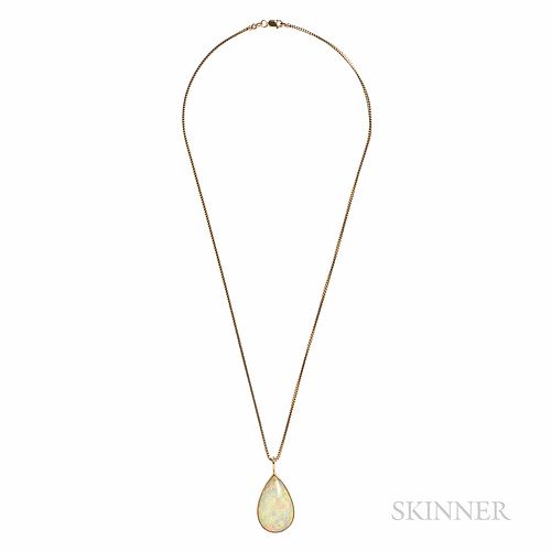 14kt Gold and Opal Pendant, bezel-set with a large pear-shape cabochon opal measuring approx. 32.00 x 20.00 mm, with chain, lg. 1 5/8,
