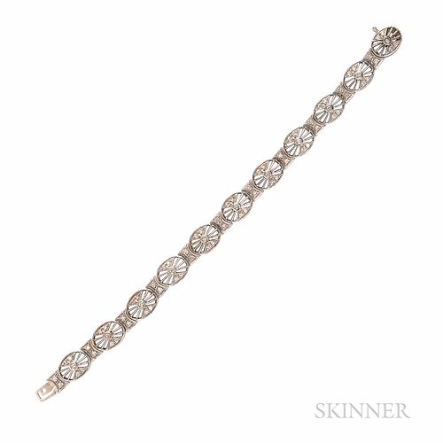14kt White Gold and Diamond Bracelet, set with full-cut diamonds, approx. total wt. 0.90 cts., 15.2 dwt, lg. 7, wd. 3/8 in.