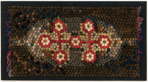 Coiled Folk Art Wool Rug, America, 19th century, the rug composed of colored coils of cloth arranged in a stylized floral pattern, ht.