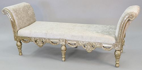 Carved and embossed silver gilt bench, highly carved in Renaissance style with scrolls and swags, with silver faux snake upholstery, ht. 33 1/2", wd. 