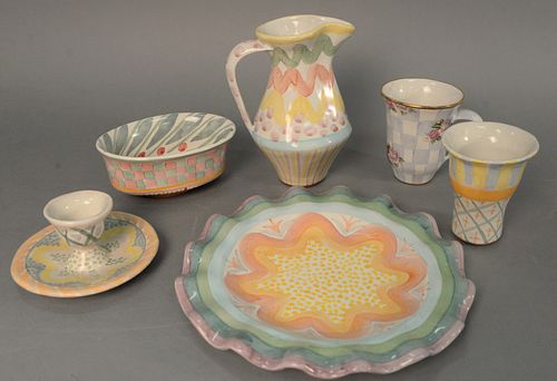 Large group of approximately twenty-eight Mackenzie Childs tableware to include six coffee cups, five scalloped edge plates, one egg cup, one large pi