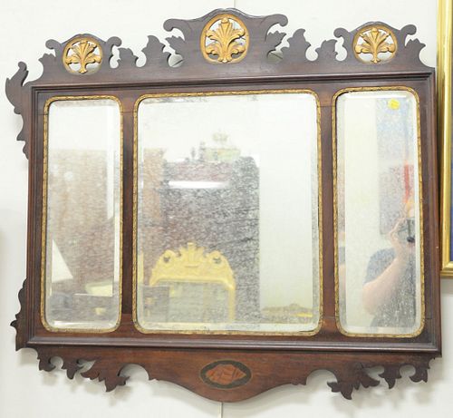 Two mirrors, small girandole having gilt shield form frame along with a three-part mahogany Chippendale-style over the mantle mirror.