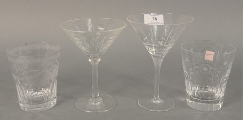 Twelve crystal glasses, William Yeoward flat bottom glasses, each marked to the underside, along with four Baccarat martini glasses, and two Christofl