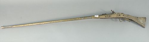 Middle Eastern Flintlock long rifle, beaded tacks and jeweled stock.