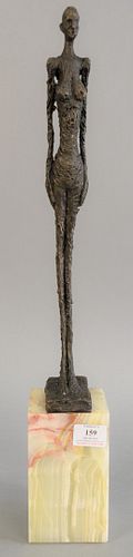 After Alberto Giacometti (Swiss, 1901-1966), thin woman, Mid-century bronze on alabaster base, marked 'Giacometti' on the base, 24 1/2" x 3 3/4" x 3 1