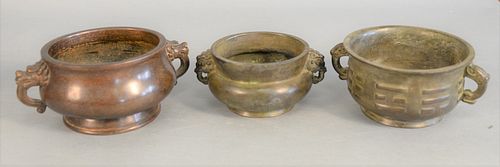 Three Chinese bronze bowl censors, ovoid form with iron head handles and four character mark base, ovoid form with trigrams design and larger ovoid fo