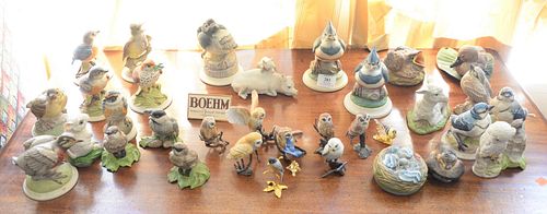 Group of thirty-four Boehm porcelain small figurines, twenty-four Boehm birds and animals along with ten boehm birds on metal bases, a majority stampe