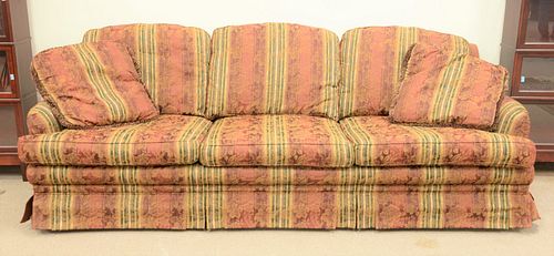 Large sofa with ottoman, ht. 34", wd. 107", dp. 44", along with a Philco tube radio and five throw rugs.