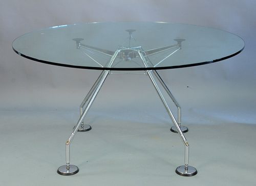 Lord Norman Foster, Tecno Mod Nomos clear glass table top with chrome base, scratches to top, ht. 28 3/4", dia. 55".
