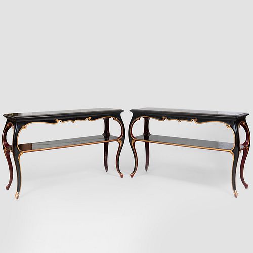 Pair of Louis XV Style Ebonized and Parcel-Gilt Two Tier Console Tables