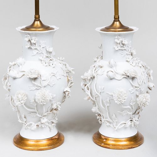 Pair of White Glazed Flower Encrusted Porcelain Vases Mounted as Lamps