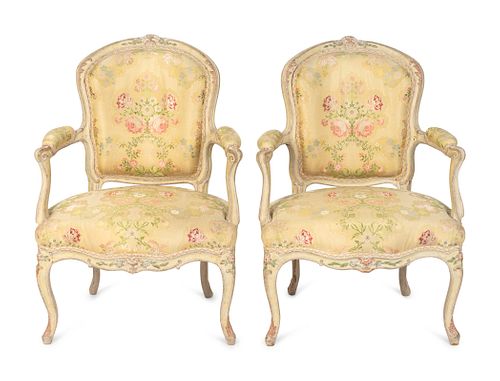A Pair of Louis XV Yellow-Painted Fauteuils en Cabriolet
Height 35 x width 25 x depth 20 inches.