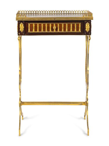 A Louis XVI Style Gilt-Bronze and Parquetry Table en Chiffoniere
Height 26 1/2 x width 16 1/2 x depth 12 inches.