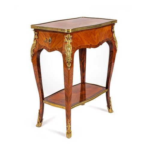 A Louis XV Style Gilt-Bronze-Mounted Kingwood and Tulipwood Table en Chiffoniere
Height 28 1/4 x width 23 x depth 13 inches.