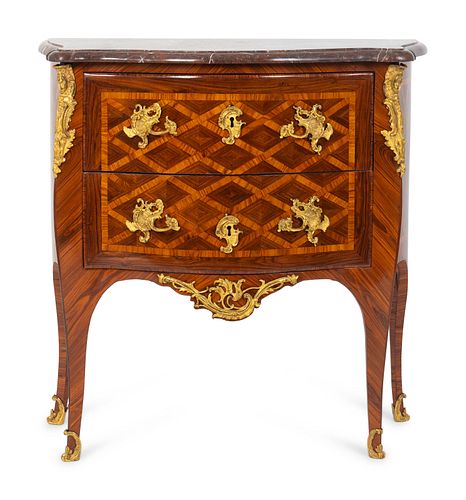 A Louis XV Gilt-Bronze-Mounted Marquetry Petit Commode
Height 22 x length 31 x depth 16 inches.