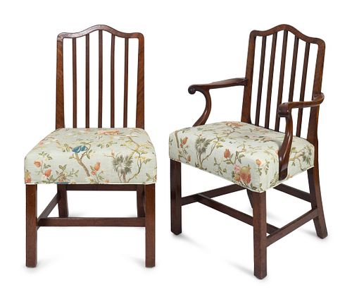 Eleven George III Mahogany Dining Chairs
Height 38 1/2 x width 22 inches.
