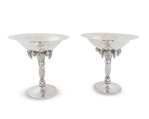 A Pair of Georg Jensen Silver Compotes
Height 7 3/4 x diameter 7 1/4 inches