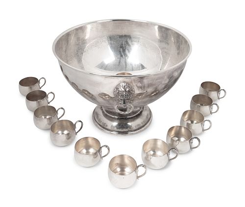 An American Silverplate Large Punchbowl and Twelve Cups
Height of bowl 11 x diameter 16 1/4 inches.