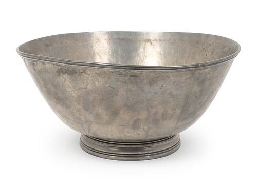 An American Pewter Punchbowl and Ladle
Height of bowl 8 x diameter 16 1/2 inches; length of ladle 11 1/2 inches.