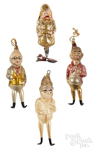 Four figural glass Christmas ornaments