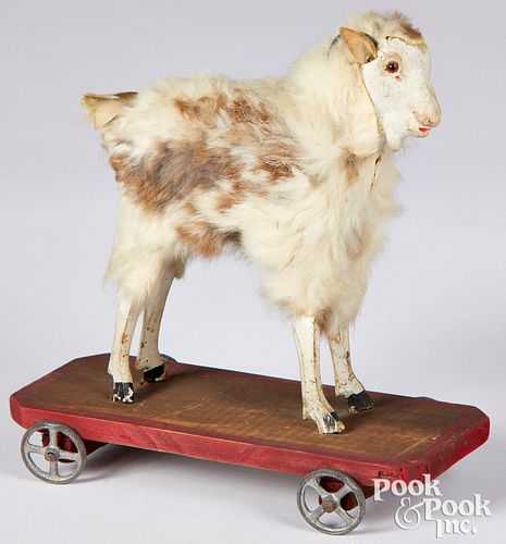 German stick leg goat on platform pull toy