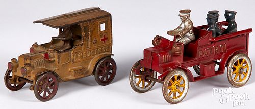 Two cast iron vehicles