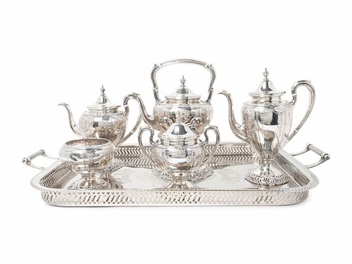 A Dominick & Haff Silver Five-Piece Tea and Coffee Service With Associated Silver Plate Two-Handled Tray
Height of hot water kettle on stand 12 1/2 in