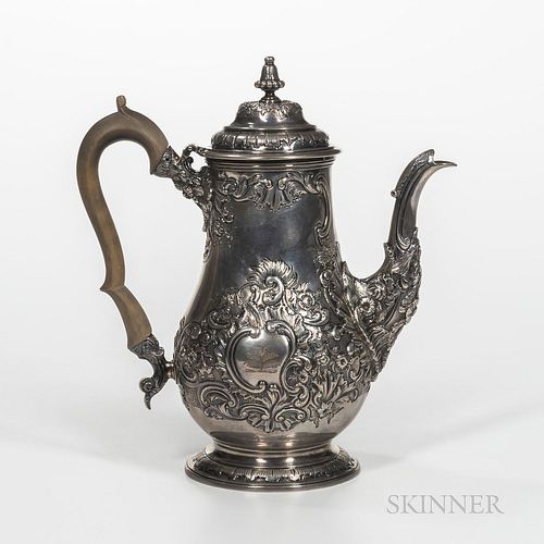 George IV Sterling Silver Coffeepot, London, 1824-25, Timothy Smith & Thomas Merryweather, maker, chased with flowers centering a rocai