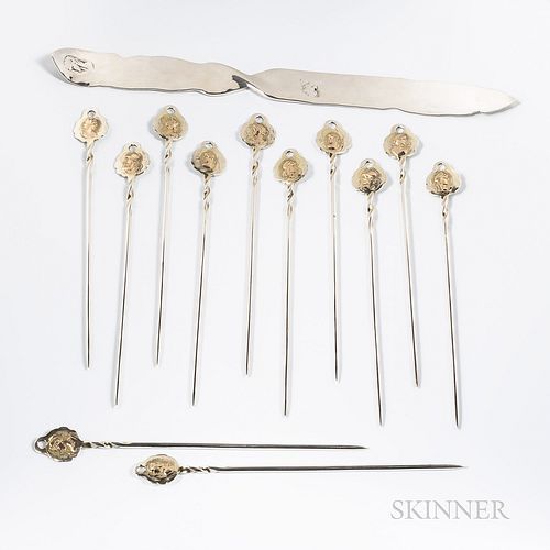 Thirteen Pieces of George Shiebler Sterling Silver Tableware, early 20th century, each in the "Medallion" pattern, comprised of a lette