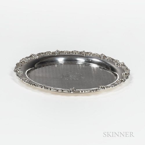 S. Kirk & Son Co. Sterling Silver Charger, Baltimore, early 20th century, with a cast grapevine motif to edge and central monogram, dia