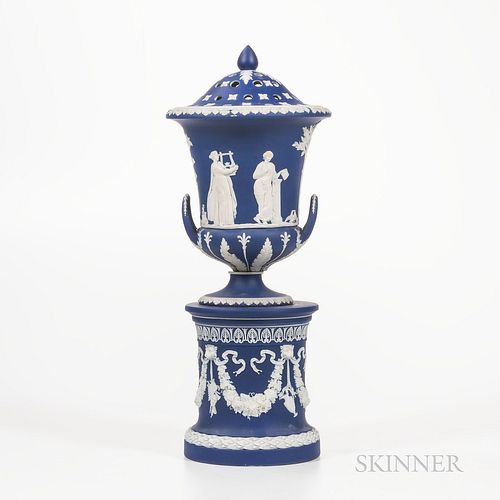 Wedgwood Dark Blue Jasper Dip Vase and Cover on Drum Base, England, 19th century, campana shape with applied white classical figures wi