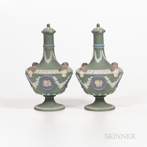 Pair of Wedgwood Four-color Jasper Dip Barber Bottles and Covers, England, 19th century, applied white relief, green ground, and lilac
