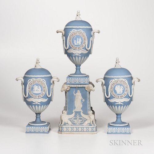 Three-piece Wedgwood Tricolor Jasper Garniture, England, 19th century, each solid light blue ground with lilac ground rings and applied