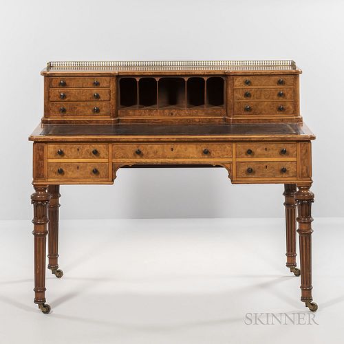 Gillow & Co. Burlwood Desk, with a leather inset writing surface, ht. 39 1/2, wd. 47 1/2, dp. 28 in.