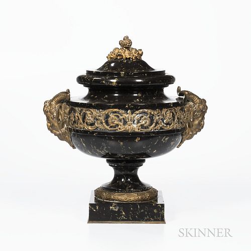 Gilt-bronze-mounted Marble Urn and Cover, 19th century, fruit finial and Bacchus head handles with a wide band of arabesque flowers, ht