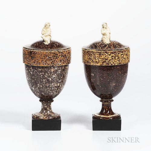 Two Similar Wedgwood & Bentley Granite Vases, England, c. 1770, white terra-cotta widow finials to a goblet shape set atop a square bla