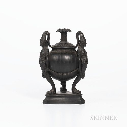 Wedgwood & Bentley Figural Vase/Candleholder, England, c. 1780, foliate molded stem and nozzle, the engine-turned bowl supported by thr