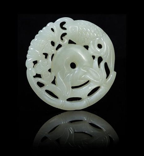 A Pierce Carved Jade Circular Pendant Diameter 2 inches.