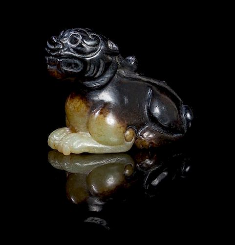 A Celadon and Brown Jade Carving of a Bixie Length 2 inches.