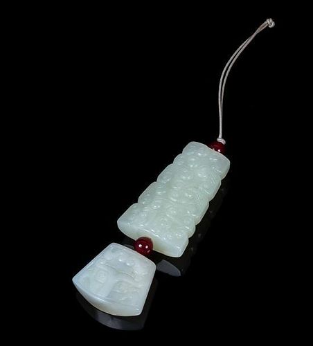 Two Carved Jade Pendants Height of jade 2 3/4 inches.