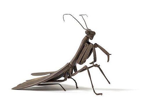 * A Japanese Silver Articulated Model of a Praying Mantis MEIJI -TAISHO PERIOD, EARLY 20TH CENTURY Length 4 inches.