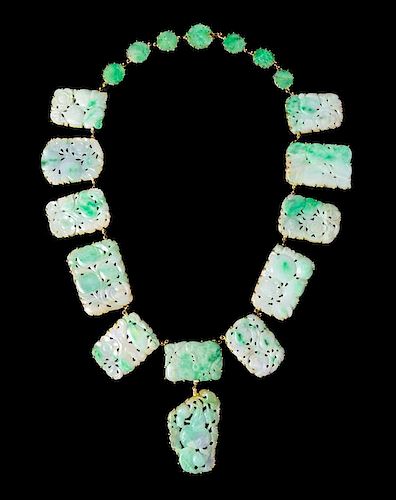 * An 18 Karat Gold and Jadeite Necklace Length overall 24 inches.