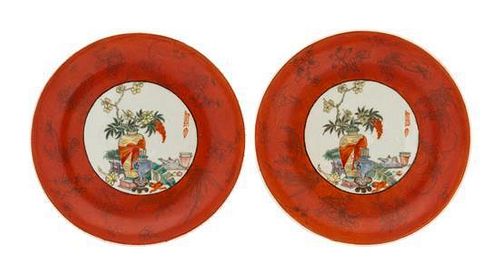* A Pair of Famille Rose and Iron Red Porcelain Plates Diameter 6 3/4 inches.
