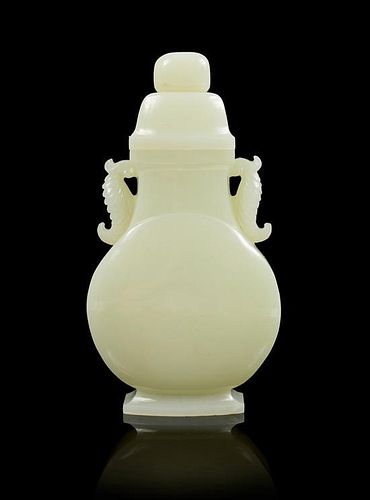 A Celadon Jade Vase and Cover Height 7 1/4 inches.