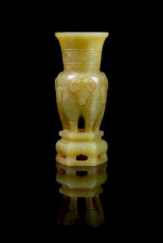 A Carved Yellow Jade Vase Height 3 3/4 inches.